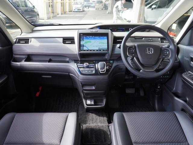 フリードハイブリッド ハイブリッド・Ｇ　ワンオーナー　９インチナビ　バックカメラ　ドラレコ　ＥＴＣ　アダプティブクルーズコントロール　両側電動スライドドア　シートヒーター　Ｂｌｕｅｔｏｏｔｈ　ＬＥＤヘッドライト　衝突被害軽減ブレーキ（9枚目）