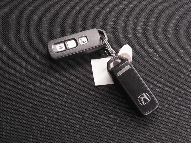 N-BOXカスタム G・Lパッケージ ワンオーナー 6.5インチメモリーナビ バックカメラ ETC 片側電動両側スライドドア ディスチャージドランプ オートエアコン ワンセグTV 純正アルミホイール 盗難防止装置 スマートキー 禁煙車(20枚目)