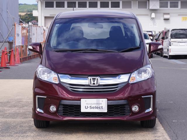 フリードハイブリッド ハイブリッドプレミアムエディション ワンオーナー 7インチナビ バックカメラ ETC クルーズコントロール 両側電動スライドドア Bluetooth ディスチャージドランプ オートエアコン 横滑り防止装置 盗難防止装置 禁煙車(12枚目)