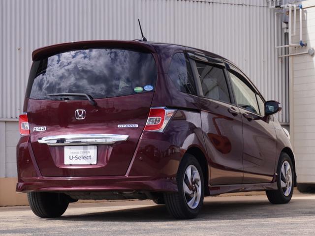 フリードハイブリッド ハイブリッドプレミアムエディション ワンオーナー 7インチナビ バックカメラ ETC クルーズコントロール 両側電動スライドドア Bluetooth ディスチャージドランプ オートエアコン 横滑り防止装置 盗難防止装置 禁煙車(14枚目)