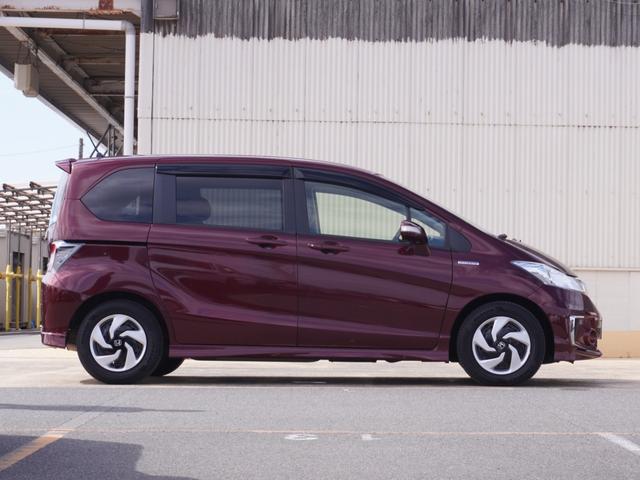 フリードハイブリッド ハイブリッドプレミアムエディション ワンオーナー 7インチナビ バックカメラ ETC クルーズコントロール 両側電動スライドドア Bluetooth ディスチャージドランプ オートエアコン 横滑り防止装置 盗難防止装置 禁煙車(27枚目)