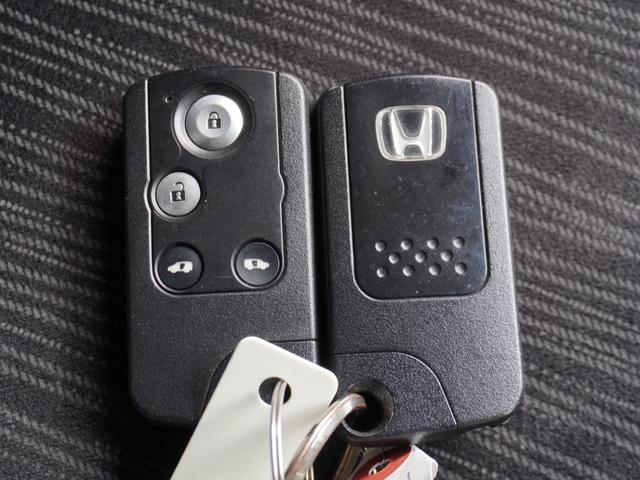 フリードハイブリッド ハイブリッドプレミアムエディション ワンオーナー 7インチナビ バックカメラ ETC クルーズコントロール 両側電動スライドドア Bluetooth ディスチャージドランプ オートエアコン 横滑り防止装置 盗難防止装置 禁煙車(36枚目)