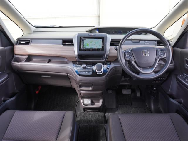 フリードハイブリッド ハイブリッド・Gホンダセンシング ワンオーナー 7インチナビ バックカメラ ドラレコ ETC アダプティブクルーズコントロール 両側電動スライドドア シートヒーター Bluetooth LEDヘッドライト 衝突被害軽減ブレーキ 禁煙車(9枚目)