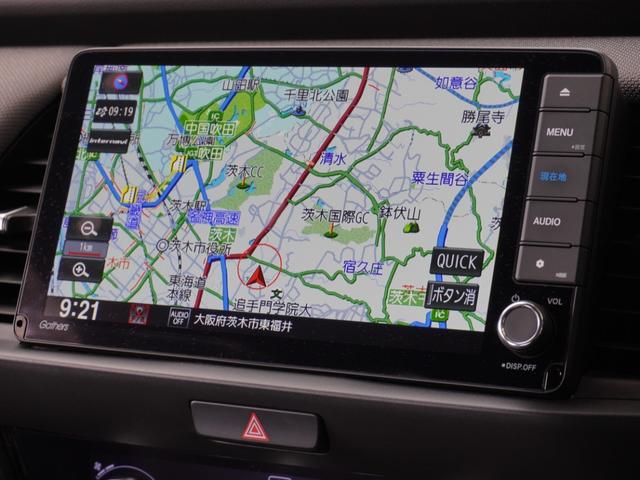 フィット ｅ：ＨＥＶクロスター　ワンオーナー　９インチナビ　バックカメラ　ドラレコ　ＥＴＣ　アダプティブクルーズコントロール　Ｂｌｕｅｔｏｏｔｈ　ＵＳＢ入力端子　ＬＥＤヘッドライト　衝突被害軽減ブレーキ　純正アルミホイール　禁煙車（3枚目）