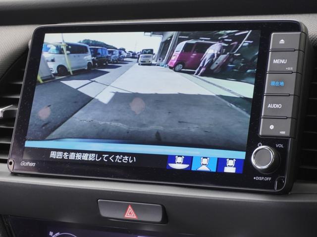 フィット ｅ：ＨＥＶクロスター　ワンオーナー　９インチナビ　バックカメラ　ドラレコ　ＥＴＣ　アダプティブクルーズコントロール　Ｂｌｕｅｔｏｏｔｈ　ＵＳＢ入力端子　ＬＥＤヘッドライト　衝突被害軽減ブレーキ　純正アルミホイール　禁煙車（4枚目）