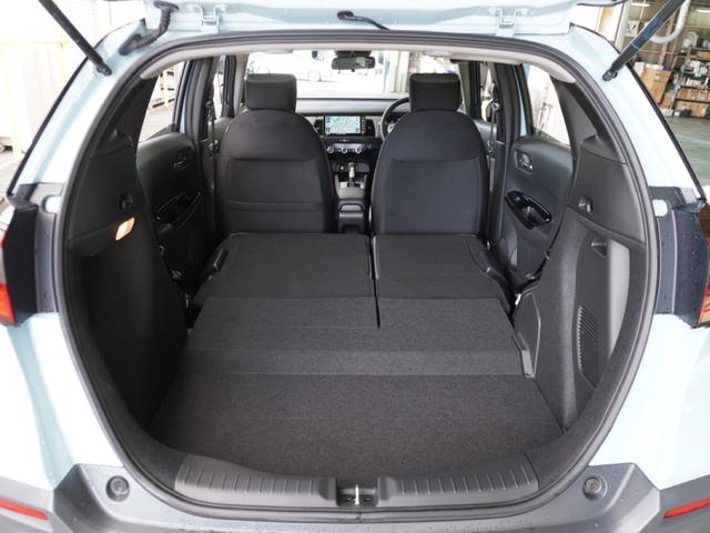 フィット ｅ：ＨＥＶクロスター　ワンオーナー　９インチナビ　バックカメラ　ドラレコ　ＥＴＣ　アダプティブクルーズコントロール　Ｂｌｕｅｔｏｏｔｈ　ＵＳＢ入力端子　ＬＥＤヘッドライト　衝突被害軽減ブレーキ　純正アルミホイール　禁煙車（13枚目）