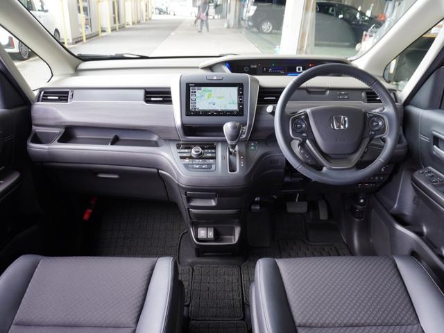 フリード Ｇ・ホンダセンシング　ワンオーナー　７インチナビ　バックカメラ　ＥＴＣ　アダプティブクルーズコントロール　両側電動スライドドア　シートヒーター　Ｂｌｕｅｔｏｏｔｈ　ＬＥＤヘッドライト　衝突被害軽減ブレーキ　禁煙車（7枚目）