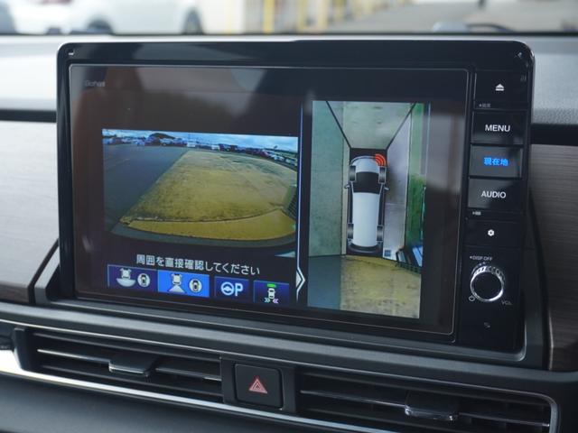 オデッセイハイブリッド ｅ：ＨＥＶアブソルート・ＥＸ　ワンオーナー　１０インチナビ　全周囲カメラ　ドラレコ　ＥＴＣ２．０　アダプティブクルーズコントロール　両側電動スライドドア　シートヒーター　オットマン　ジェスチャーコントロールパワースライドドア（5枚目）