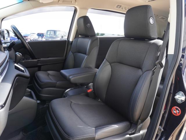 オデッセイハイブリッド ｅ：ＨＥＶアブソルート・ＥＸ　ワンオーナー　１０インチナビ　全周囲カメラ　ドラレコ　ＥＴＣ２．０　アダプティブクルーズコントロール　両側電動スライドドア　シートヒーター　オットマン　ジェスチャーコントロールパワースライドドア（10枚目）