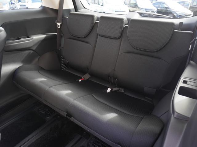 オデッセイハイブリッド ｅ：ＨＥＶアブソルート・ＥＸ　ワンオーナー　１０インチナビ　全周囲カメラ　ドラレコ　ＥＴＣ２．０　アダプティブクルーズコントロール　両側電動スライドドア　シートヒーター　オットマン　ジェスチャーコントロールパワースライドドア（12枚目）