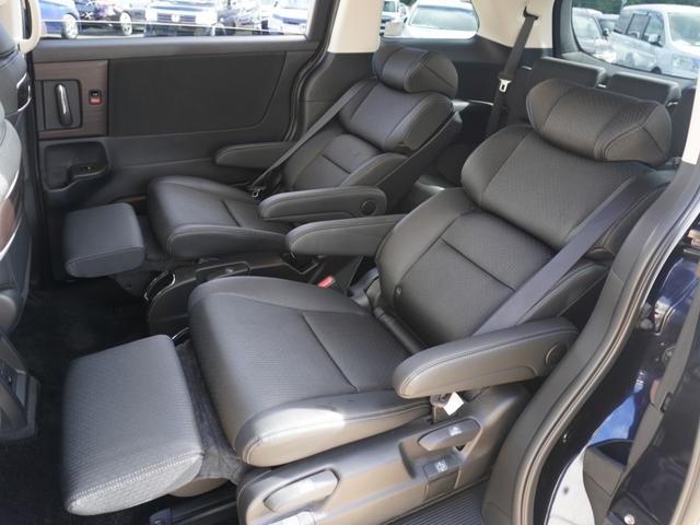 オデッセイハイブリッド ｅ：ＨＥＶアブソルート・ＥＸ　ワンオーナー　１０インチナビ　全周囲カメラ　ドラレコ　ＥＴＣ２．０　アダプティブクルーズコントロール　両側電動スライドドア　シートヒーター　オットマン　ジェスチャーコントロールパワースライドドア（13枚目）