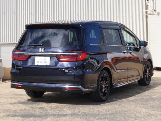 オデッセイハイブリッド ｅ：ＨＥＶアブソルート・ＥＸ　ワンオーナー　１０インチナビ　全周囲カメラ　ドラレコ　ＥＴＣ２．０　アダプティブクルーズコントロール　両側電動スライドドア　シートヒーター　オットマン　ジェスチャーコントロールパワースライドドア（16枚目）