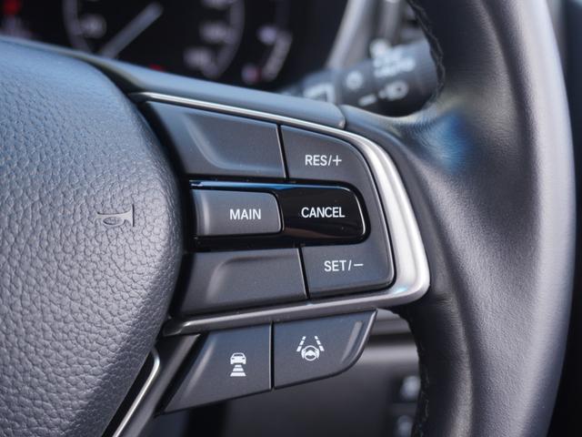 オデッセイハイブリッド ｅ：ＨＥＶアブソルート・ＥＸ　ワンオーナー　１０インチナビ　全周囲カメラ　ドラレコ　ＥＴＣ２．０　アダプティブクルーズコントロール　両側電動スライドドア　シートヒーター　オットマン　ジェスチャーコントロールパワースライドドア（19枚目）