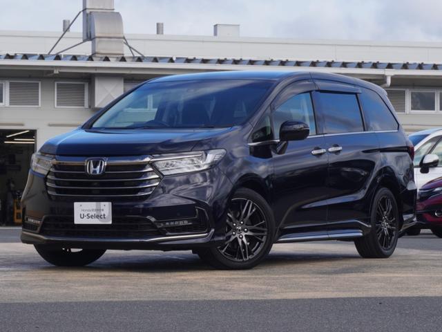 オデッセイハイブリッド ｅ：ＨＥＶアブソルート・ＥＸ　ワンオーナー　１０インチナビ　全周囲カメラ　ドラレコ　ＥＴＣ２．０　アダプティブクルーズコントロール　両側電動スライドドア　シートヒーター　オットマン　ジェスチャーコントロールパワースライドドア（25枚目）