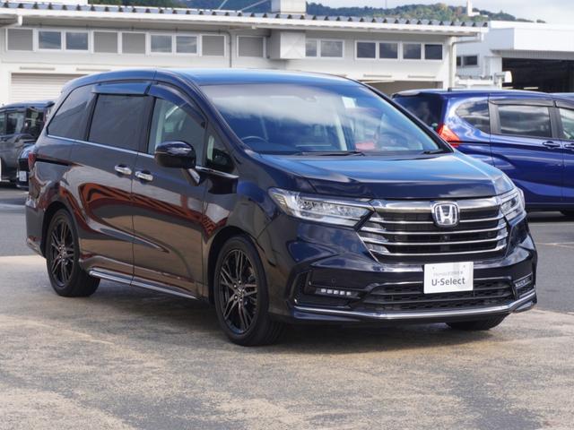 オデッセイハイブリッド ｅ：ＨＥＶアブソルート・ＥＸ　ワンオーナー　１０インチナビ　全周囲カメラ　ドラレコ　ＥＴＣ２．０　アダプティブクルーズコントロール　両側電動スライドドア　シートヒーター　オットマン　ジェスチャーコントロールパワースライドドア（26枚目）