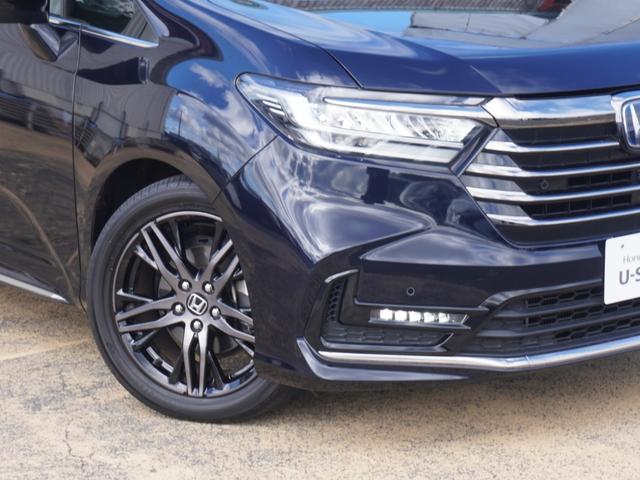 オデッセイハイブリッド ｅ：ＨＥＶアブソルート・ＥＸ　ワンオーナー　１０インチナビ　全周囲カメラ　ドラレコ　ＥＴＣ２．０　アダプティブクルーズコントロール　両側電動スライドドア　シートヒーター　オットマン　ジェスチャーコントロールパワースライドドア（28枚目）