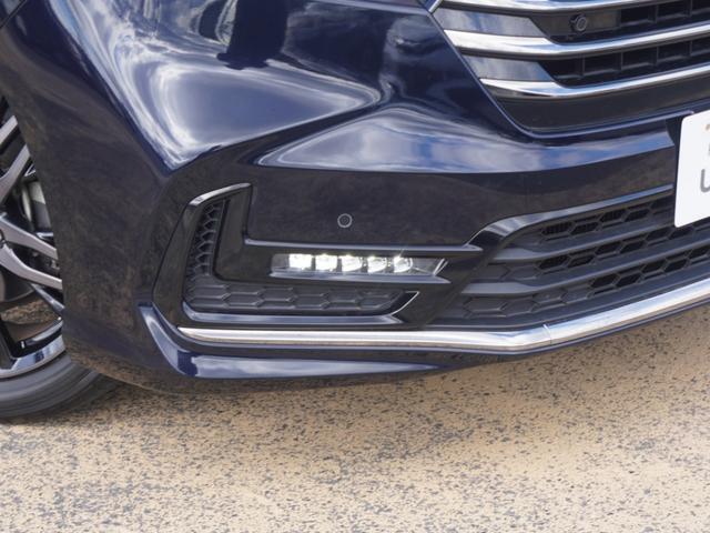 オデッセイハイブリッド ｅ：ＨＥＶアブソルート・ＥＸ　ワンオーナー　１０インチナビ　全周囲カメラ　ドラレコ　ＥＴＣ２．０　アダプティブクルーズコントロール　両側電動スライドドア　シートヒーター　オットマン　ジェスチャーコントロールパワースライドドア（30枚目）