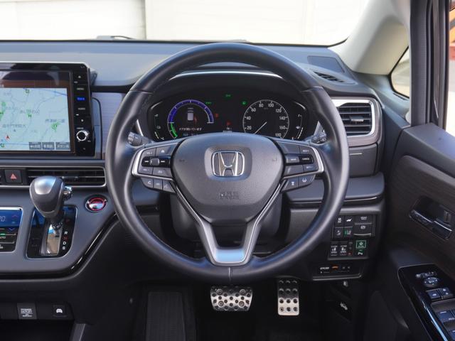 オデッセイハイブリッド ｅ：ＨＥＶアブソルート・ＥＸ　ワンオーナー　１０インチナビ　全周囲カメラ　ドラレコ　ＥＴＣ２．０　アダプティブクルーズコントロール　両側電動スライドドア　シートヒーター　オットマン　ジェスチャーコントロールパワースライドドア（43枚目）