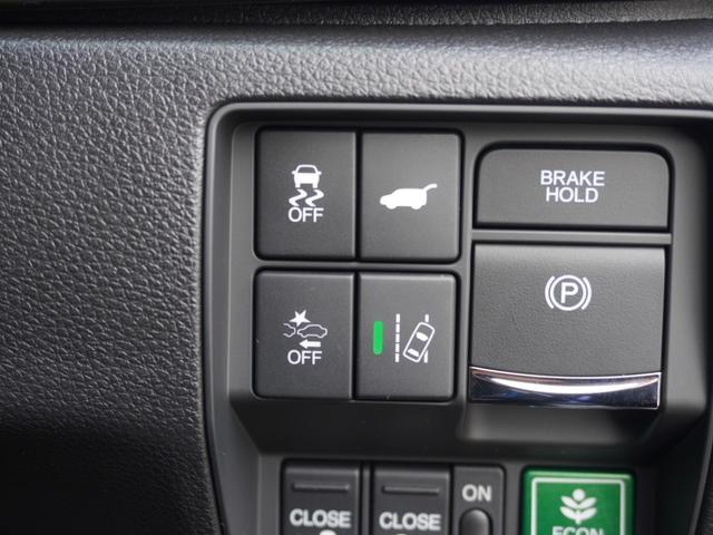 オデッセイハイブリッド ｅ：ＨＥＶアブソルート・ＥＸ　ワンオーナー　１０インチナビ　全周囲カメラ　ドラレコ　ＥＴＣ２．０　アダプティブクルーズコントロール　両側電動スライドドア　シートヒーター　オットマン　ジェスチャーコントロールパワースライドドア（50枚目）