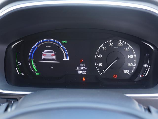 オデッセイハイブリッド ｅ：ＨＥＶアブソルート・ＥＸ　ワンオーナー　１０インチナビ　全周囲カメラ　ドラレコ　ＥＴＣ２．０　アダプティブクルーズコントロール　両側電動スライドドア　シートヒーター　オットマン　ジェスチャーコントロールパワースライドドア（54枚目）