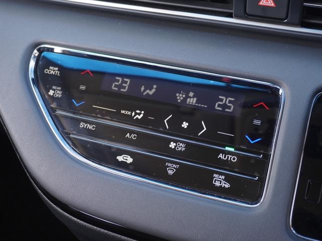 オデッセイハイブリッド ｅ：ＨＥＶアブソルート・ＥＸ　ワンオーナー　１０インチナビ　全周囲カメラ　ドラレコ　ＥＴＣ２．０　アダプティブクルーズコントロール　両側電動スライドドア　シートヒーター　オットマン　ジェスチャーコントロールパワースライドドア（57枚目）