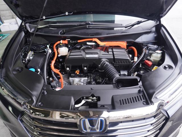 オデッセイハイブリッド ｅ：ＨＥＶアブソルート・ＥＸ　ワンオーナー　１０インチナビ　全周囲カメラ　ドラレコ　ＥＴＣ２．０　アダプティブクルーズコントロール　両側電動スライドドア　シートヒーター　オットマン　ジェスチャーコントロールパワースライドドア（69枚目）