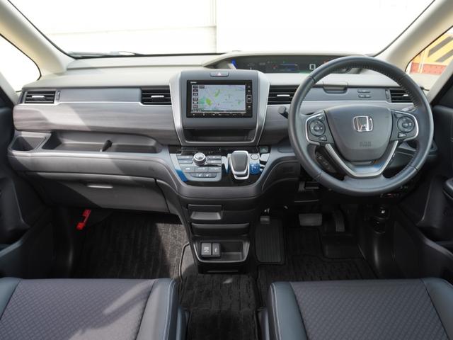 フリードハイブリッド ハイブリッド・Gホンダセンシング ワンオーナー 7インチナビ バックカメラ ETC アダプティブクルーズコントロール 両側電動スライドドア シートヒーター Bluetooth DVD再生 LEDヘッドライト 衝突被害軽減ブレーキ(7枚目)