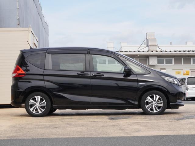 フリードハイブリッド ハイブリッド・Gホンダセンシング ワンオーナー 7インチナビ バックカメラ ETC アダプティブクルーズコントロール 両側電動スライドドア シートヒーター Bluetooth DVD再生 LEDヘッドライト 衝突被害軽減ブレーキ(26枚目)