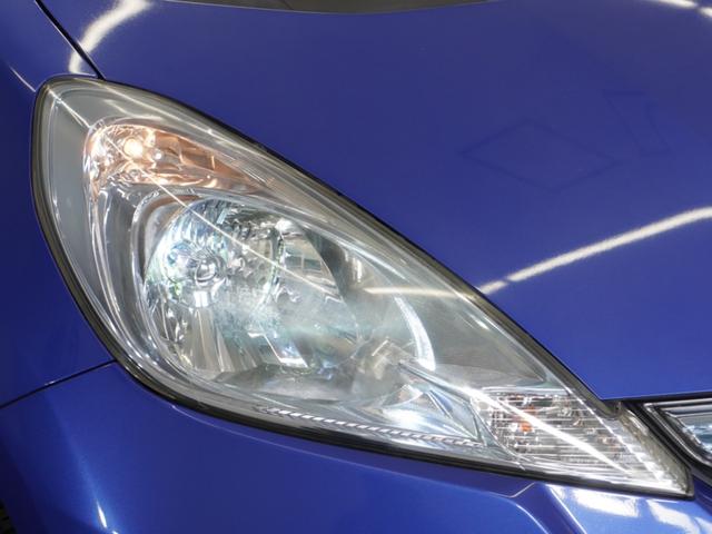 フィットハイブリッド ハイブリッド・10thアニバーサリー 1年保証ナビRカメETCクルコンDVD再生HID フルセグTV スマートキー スペアキー有 CD/DVD再生 アイドリングストップ 盗難防止装置 チップアップシート(10枚目)