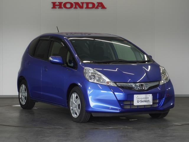 フィットハイブリッド ハイブリッド・10thアニバーサリー 1年保証ナビRカメETCクルコンDVD再生HID フルセグTV スマートキー スペアキー有 CD/DVD再生 アイドリングストップ 盗難防止装置 チップアップシート(11枚目)