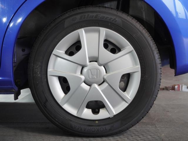 フィットハイブリッド ハイブリッド・10thアニバーサリー 1年保証ナビRカメETCクルコンDVD再生HID フルセグTV スマートキー スペアキー有 CD/DVD再生 アイドリングストップ 盗難防止装置 チップアップシート(14枚目)