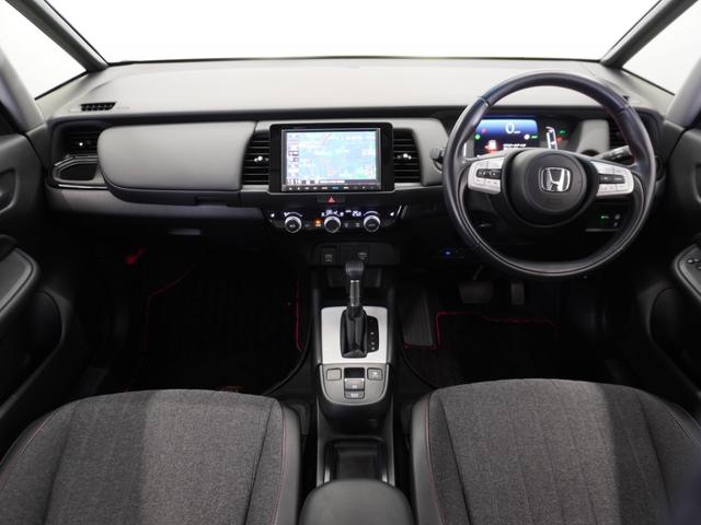 フィット e:HEVホーム20周年特別仕様車カーサ 2年保証ナビDレコRカメETCクルコンBT地デジ 渋滞追従クルーズ 障害物センサー シートヒーター オートハイビーム Bluetooth フルセグTV 16インチ純正アルミホイール(8枚目)