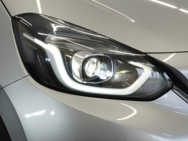 フィット e:HEVホーム20周年特別仕様車カーサ 2年保証ナビDレコRカメETCクルコンBT地デジ 渋滞追従クルーズ 障害物センサー シートヒーター オートハイビーム Bluetooth フルセグTV 16インチ純正アルミホイール(16枚目)