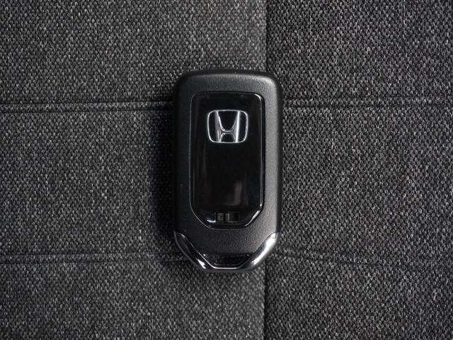 フィット e:HEVホーム20周年特別仕様車カーサ 2年保証ナビDレコRカメETCクルコンBT地デジ 渋滞追従クルーズ 障害物センサー シートヒーター オートハイビーム Bluetooth フルセグTV 16インチ純正アルミホイール(21枚目)