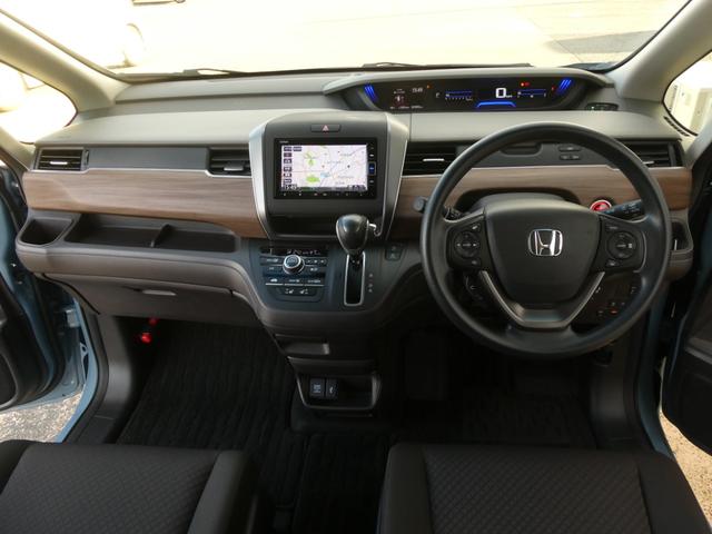 フリード G・ホンダセンシング ワンオーナー 7インチナビ バックカメラ ETC アダプティブクルーズコントロール 両側電動スライドドア Bluetooth LEDヘッドライト 衝突被害軽減ブレーキ フルセグTV ABS 禁煙車(7枚目)