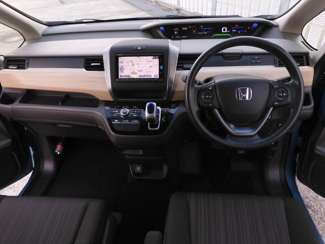 フリードハイブリッド ハイブリッド・Gホンダセンシング ワンオーナー 7インチナビ バックカメラ ETC アダプティブクルーズコントロール 両側電動スライドドア フルセグ Bluetooth LEDヘッドライト 衝突被害軽減ブレーキ スマートキー 禁煙車(7枚目)