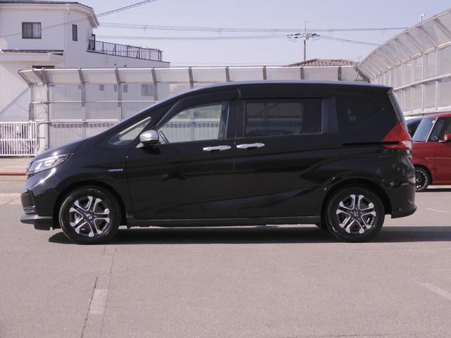 フリードハイブリッド ハイブリッド・クロスターホンダセンシング 9インチナビ Bluetooth Rカメラ 音楽録音 LEDオートライト 両側パワースライドドア 前後ドラレコ スマートキー2個 本革ステアリング 衝突軽減ブレーキ レーンキープ ワンオーナー(16枚目)