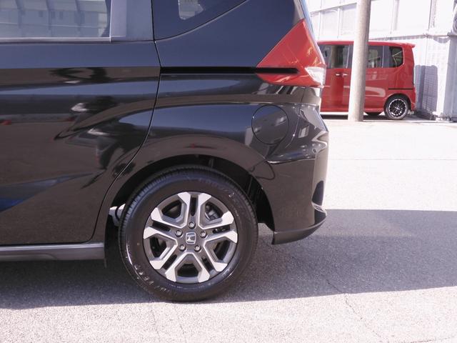 フリードハイブリッド ハイブリッド・クロスターホンダセンシング 9インチナビ Bluetooth Rカメラ 音楽録音 LEDオートライト 両側パワースライドドア 前後ドラレコ スマートキー2個 本革ステアリング 衝突軽減ブレーキ レーンキープ ワンオーナー(39枚目)