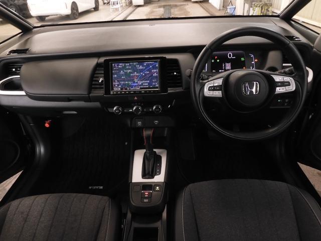 フィット e:HEVホーム ワンオーナー 8インチナビ バックカメラ ドラレコ ETC アダプティブクルーズコントロール Bluetooth USB入力端子 LEDヘッドライト 衝突被害軽減ブレーキ 社外アルミホイール 禁煙車(8枚目)