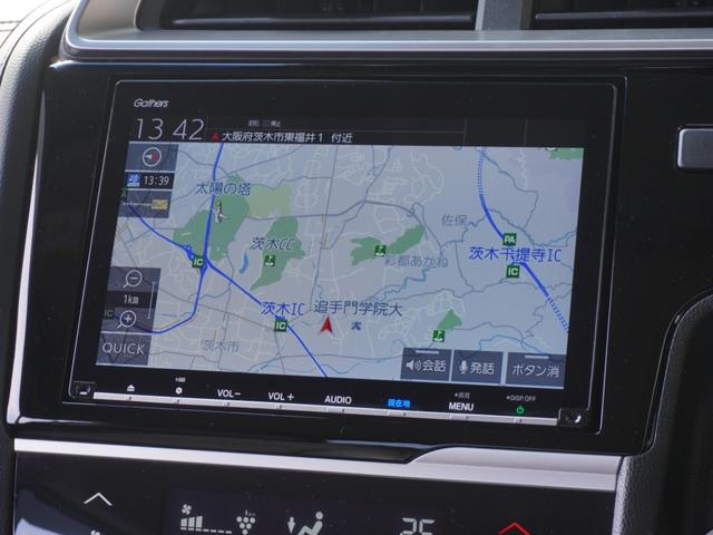 フィットハイブリッド Lホンダセンシング ワンオーナー 8インチナビ バックカメラ ドラレコ ETC アダプティブクルーズコントロール Bluetooth USB入力端子 LEDヘッドライト 衝突被害軽減ブレーキ オートエアコン 禁煙車(3枚目)