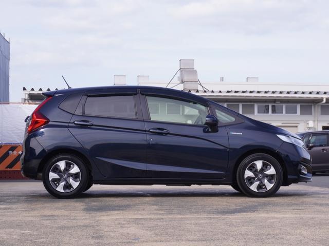 フィットハイブリッド Lホンダセンシング ワンオーナー 8インチナビ バックカメラ ドラレコ ETC アダプティブクルーズコントロール Bluetooth USB入力端子 LEDヘッドライト 衝突被害軽減ブレーキ オートエアコン 禁煙車(27枚目)