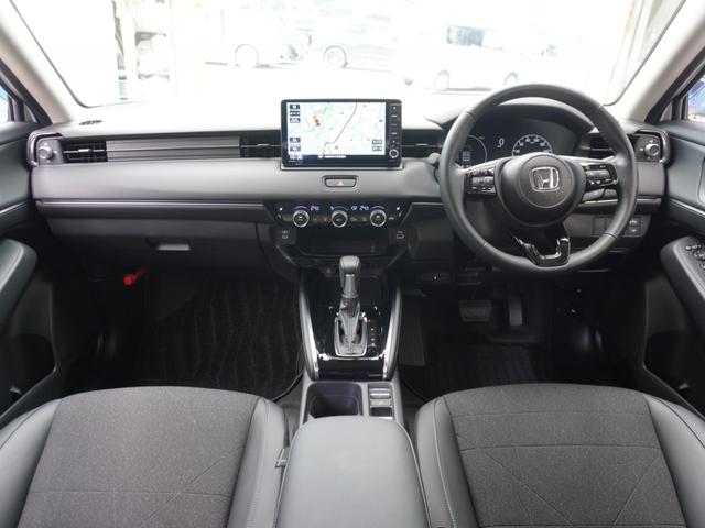 ヴェゼル e:HEVZ ワンオーナー 9インチナビ バックカメラ ETC アダプティブクルーズコントロール シートヒーター フルセグ LEDヘッドライト 衝突被害軽減ブレーキ 減速セレクター 純正アルミホイール 禁煙車(12枚目)