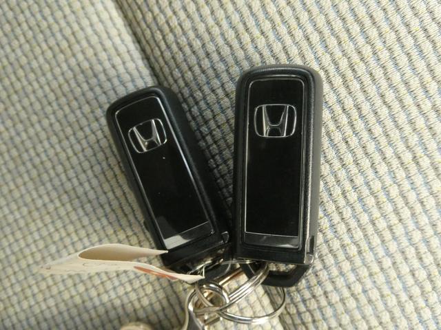 N-WGN Gホンダセンシング ワンオーナー アダプティブクルーズコントロール オートエアコン スマートキー アイドリングストップ CD再生 オートライト 障害物センサー 横滑り防止装置 衝突被害軽減ブレーキ 盗難防止装置 禁煙車(55枚目)