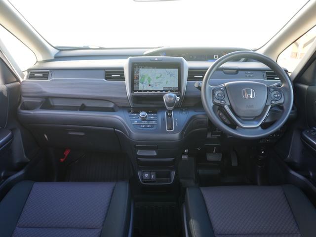 フリード Ｇブラックスタイル　ワンオーナー　９インチナビ　バックカメラ　ＥＴＣ　アダプティブクルーズコントロール　両側電動スライドドア　シートヒーター　Ｂｌｕｅｔｏｏｔｈ　ＬＥＤヘッドライト　衝突被害軽減ブレーキ　禁煙車（8枚目）