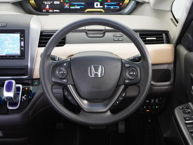 フリードハイブリッド ハイブリッド・Ｇホンダセンシング　１年保証ナビ後席モニタＲカメＥＴＣ両電扉ＢＴ　アダプティブクルーズコントロール　Ｂｌｕｅｔｏｏｔｈ　フルセグＴＶ　ＤＶＤ再生　ミュージックサーバー　衝突軽減ブレーキ　スペアキー有り　レーンアシスト（9枚目）