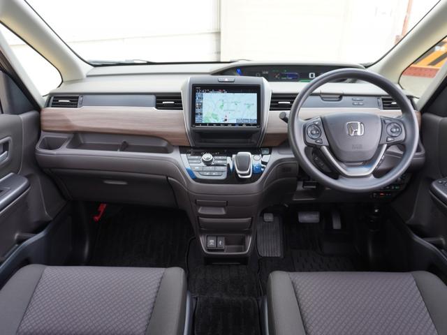 フリードハイブリッド ハイブリッド・Ｇホンダセンシング　ワンオーナー　９インチナビ　バックカメラ　ドラレコ　ＥＴＣ　アダプティブクルーズコントロール　両側電動スライドドア　シートヒーター　Ｂｌｕｅｔｏｏｔｈ　ＬＥＤヘッドライト　衝突被害軽減ブレーキ（9枚目）