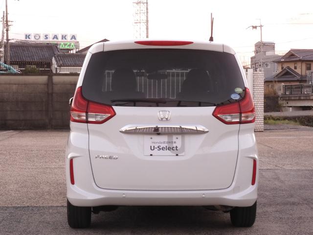 フリード Ｇ・ホンダセンシング　ワンオーナー車　７インチナビ（純正用品ＶＸＭ－２１４ＶＦｉ）　バックカメラ　社外ドラレコ　ＥＴＣ　両側電動スライドドア　シートヒーター　Ｂｌｕｅｔｏｏｔｈ　ＬＥＤオートライト　衝突被害軽減ブレーキ（14枚目）