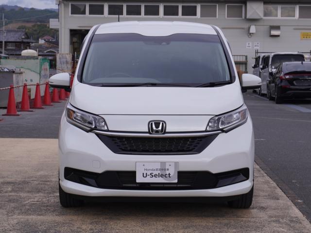 フリードハイブリッド ハイブリッド・Ｇホンダセンシング　ワンオーナー　９インチナビ　後席モニター　バックカメラ　ＥＴＣ　アダプティブクルーズコントロール　両側電動スライドドア　シートヒーター　Ｂｌｕｅｔｏｏｔｈ　ＬＥＤヘッドライト　禁煙車　スペアキー有り（13枚目）