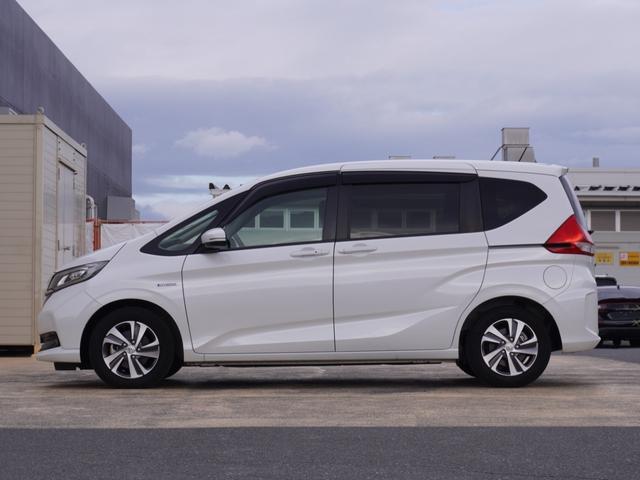 フリードハイブリッド ハイブリッド・Ｇホンダセンシング　ワンオーナー　９インチナビ　後席モニター　バックカメラ　ＥＴＣ　アダプティブクルーズコントロール　両側電動スライドドア　シートヒーター　Ｂｌｕｅｔｏｏｔｈ　ＬＥＤヘッドライト　禁煙車　スペアキー有り（16枚目）