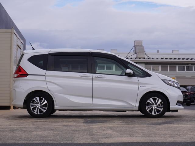 フリードハイブリッド ハイブリッド・Ｇホンダセンシング　ワンオーナー　９インチナビ　後席モニター　バックカメラ　ＥＴＣ　アダプティブクルーズコントロール　両側電動スライドドア　シートヒーター　Ｂｌｕｅｔｏｏｔｈ　ＬＥＤヘッドライト　禁煙車　スペアキー有り（27枚目）